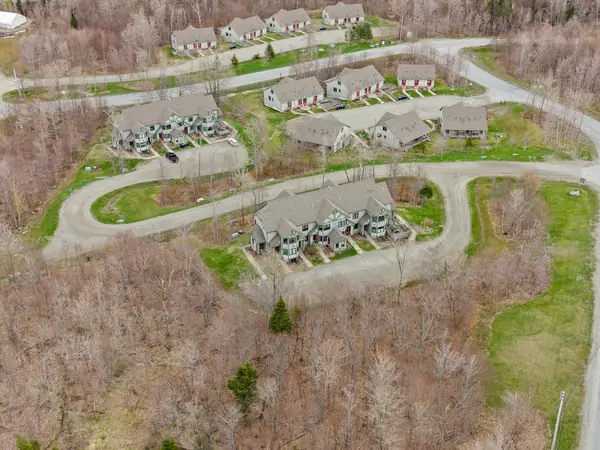 Aerial view of the condo community nestled into the hillside
