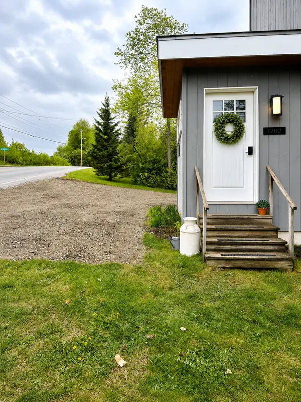 Front entry and driveway approach to the house
