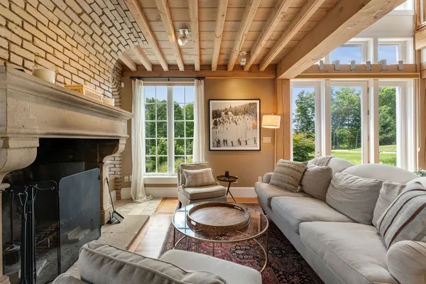 Living room fireplace with sectional sofa