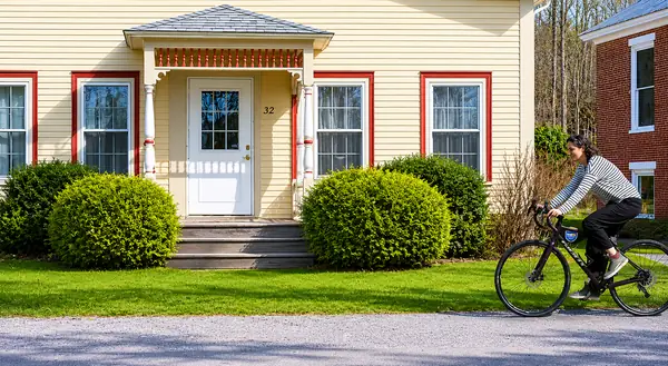 Historic yellow cottage on the village common