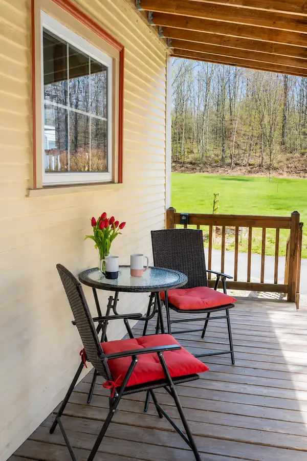 Bistro table for two on the side porch