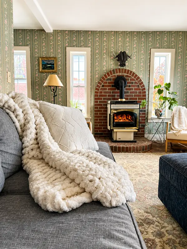 Cozy seating area beside the wood stove