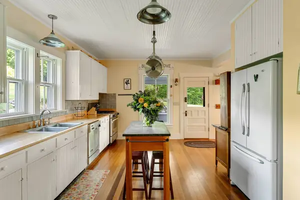 Bright farmhouse kitchen with island seating