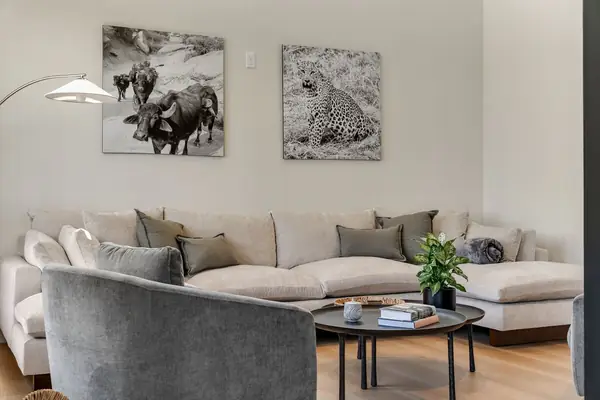 Sectional sofa with artwork in the open living space