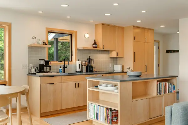 Bright kitchen with maple cabinetry and island