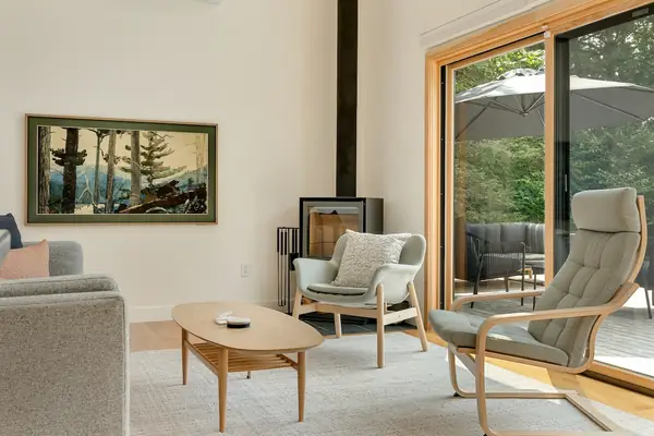 Wood stove and lounge chairs in the living room